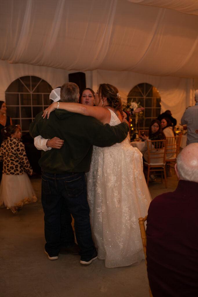 Friends of the bride and groom joined in after first dance