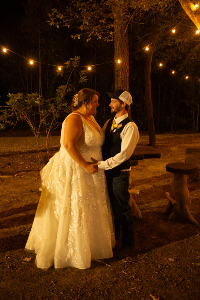 Bride and groom sneaking away for a few moments 