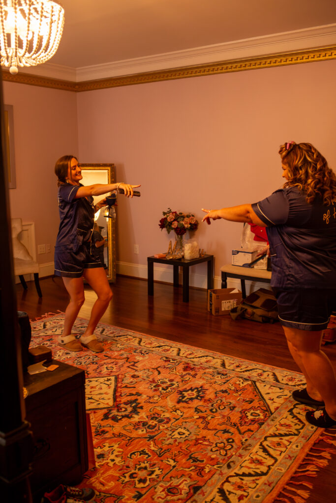 Bridesmaids singing and dancing